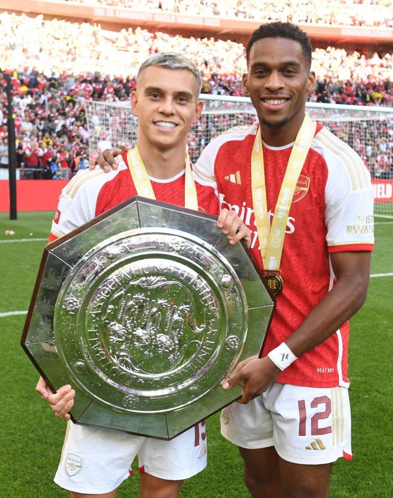 Trossard and Timber holding community shield